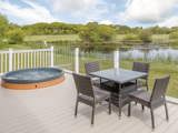 Beautiful lake views and sunken hot tubs at Florence Springs Luxury Lakeside Lodges - Tenby, Pembrokeshire, South Wales