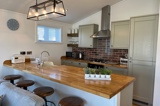 Pine Tree Lodge kitchen - Florence Springs Luxury Lodges with hot tubs, Tenby, Pembrokeshire, South West Wales
