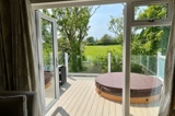 Primrose Lodge decking and hot tub - Florence Springs Luxury Lodges with hot tubs, Tenby, Pembrokeshire, South West Wales