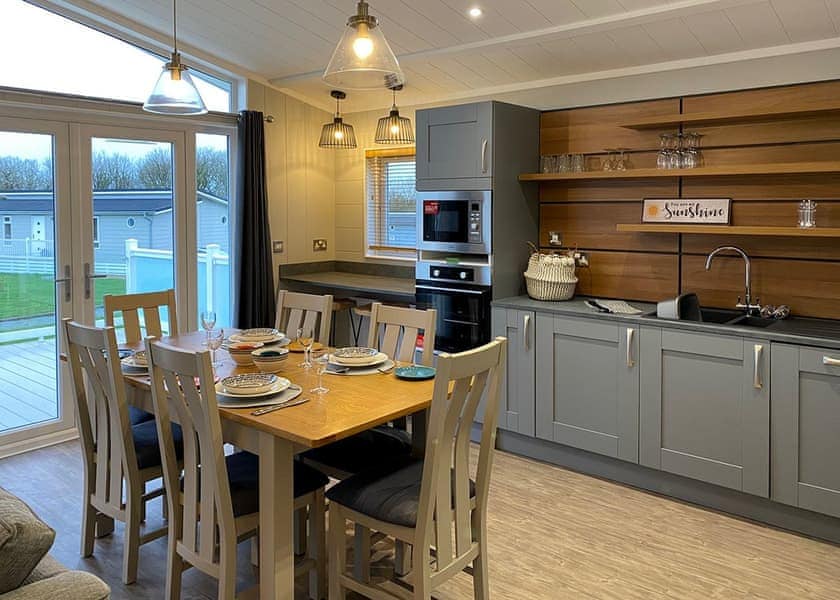 Snowdrop Lodge dining area - Florence Springs Luxury Lodges with hot tubs, Tenby, Pembrokeshire, South West Wales