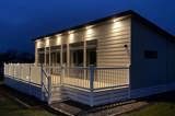 Fuchsia Lodge at night - Florence Springs Luxury Lodges, Tenby, Pembrokeshire, South West Wales
