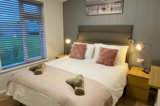 Walnut Lodge double bedroom - Florence Springs Luxury Lodges with hot tubs, Tenby, Pembrokeshire, South West Wales